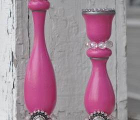 Pink candle holders.